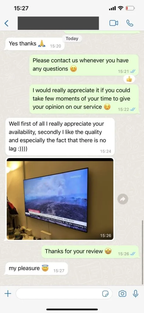 WhatsApp support conversation confirming Firestick playlist setup on Shack TV